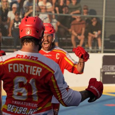 Two Dek Hockey Players in Quebec celebrating