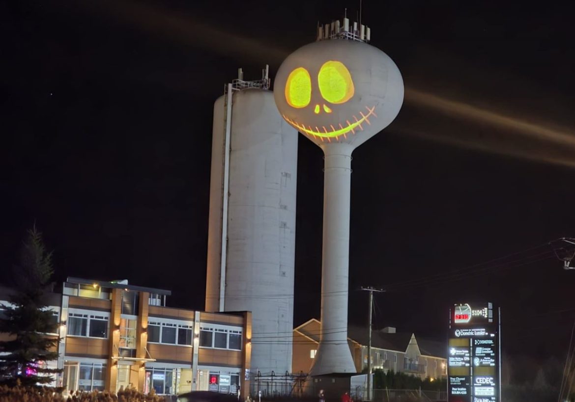 Halloween projection on water towers in Rock Forest